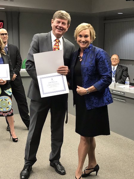 John Briscoe Receiving Award For School Board Service